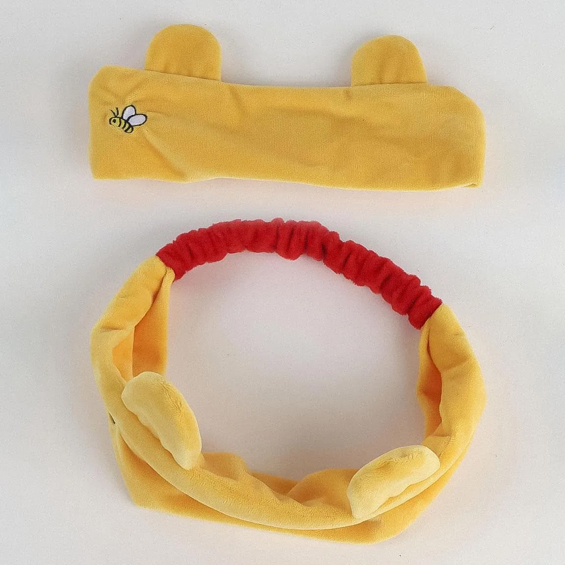 gele haarband met berenoortjes en rood elastiek