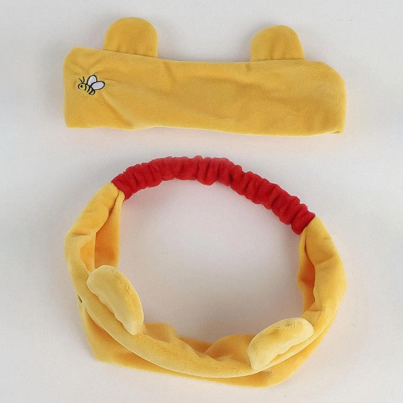 gele haarband met berenoortjes en rood elastiek