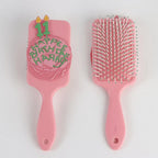 roze haarborstel Happee Birthdae Harry voor- en achterkant