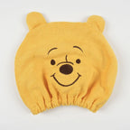 gele haarmuts met Pooh gezicht en oortjes
