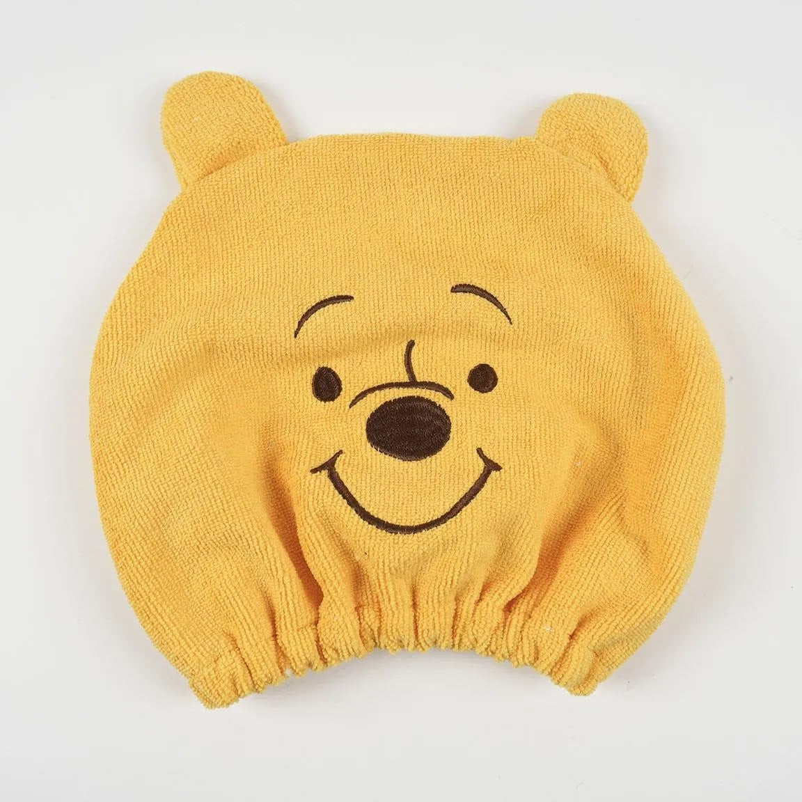 gele haarmuts met Pooh gezicht en oortjes