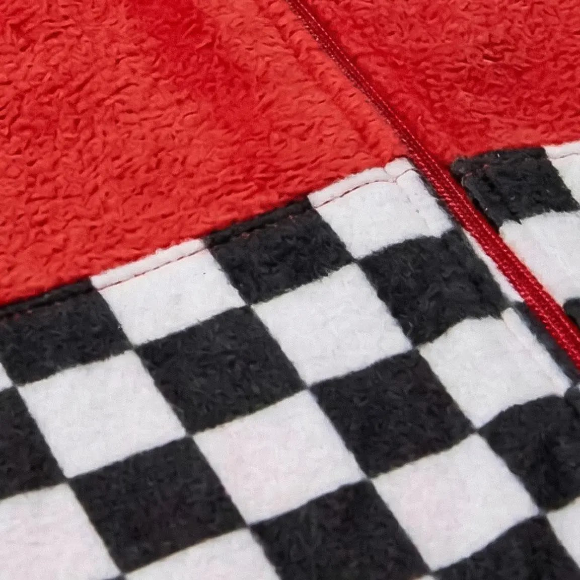 Detail geblokte finishvlag band en rits