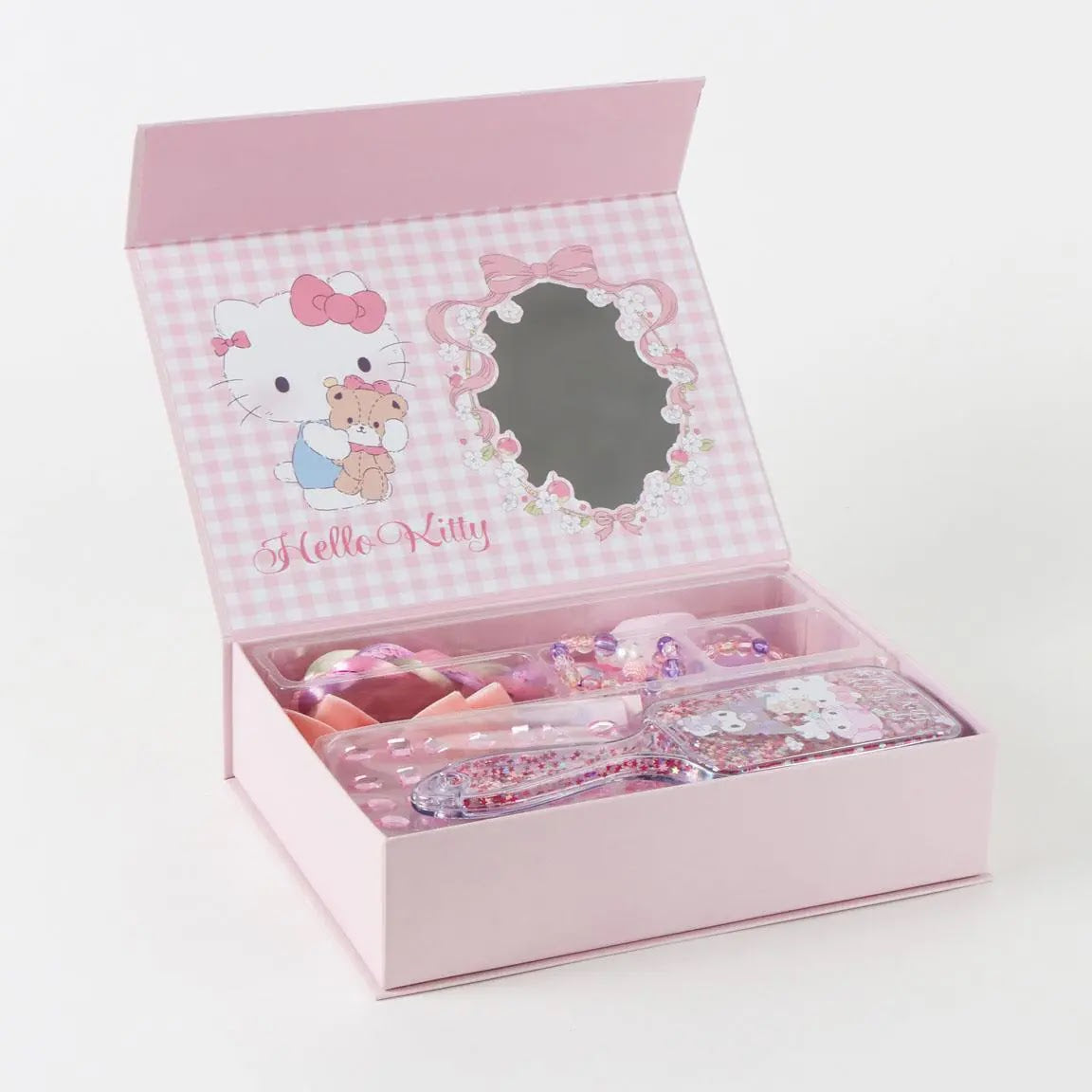 Geopende Hello Kitty cadeaudoos met spiegeltje in het deksel