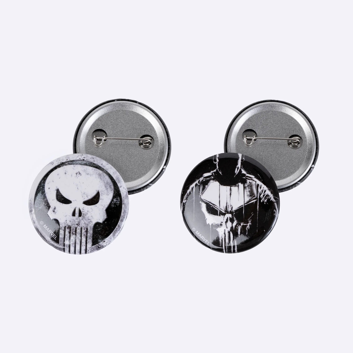 Twee buttons met het Punisher doodshoofd
