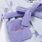 Detail zak met KUROMI tekst en lila ceintuur