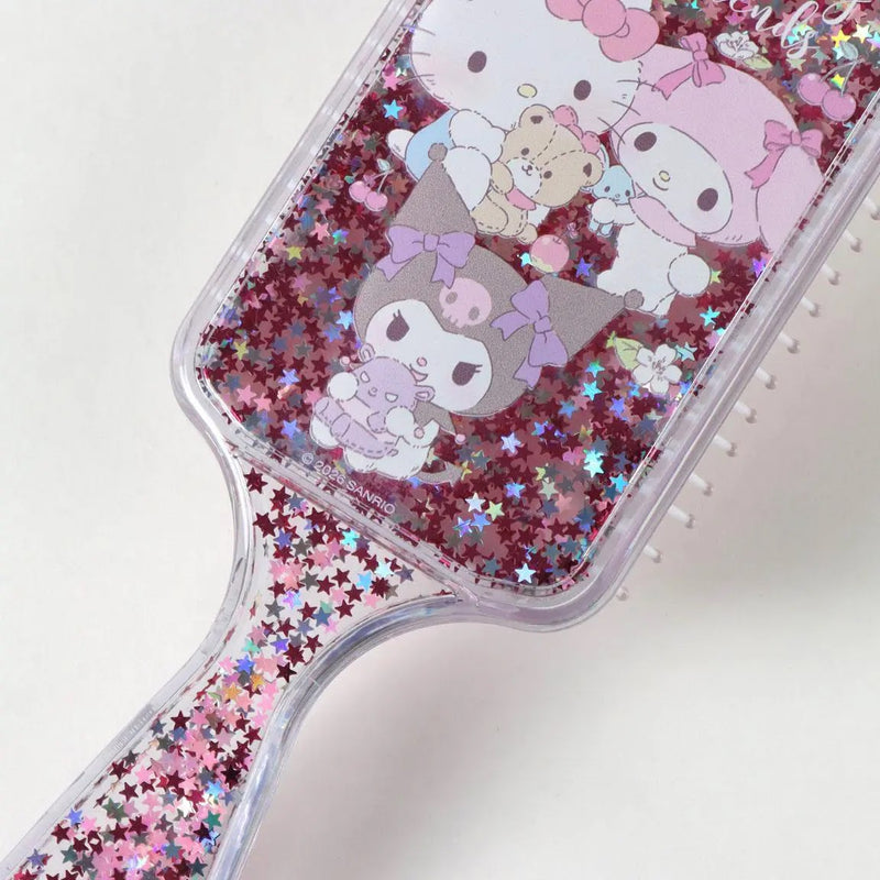 Detail haarborstel met Hello Kitty, My Melody en Kuromi