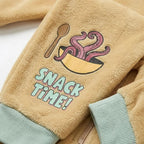 Detail Snack Time print op het been met mintgroen boordje