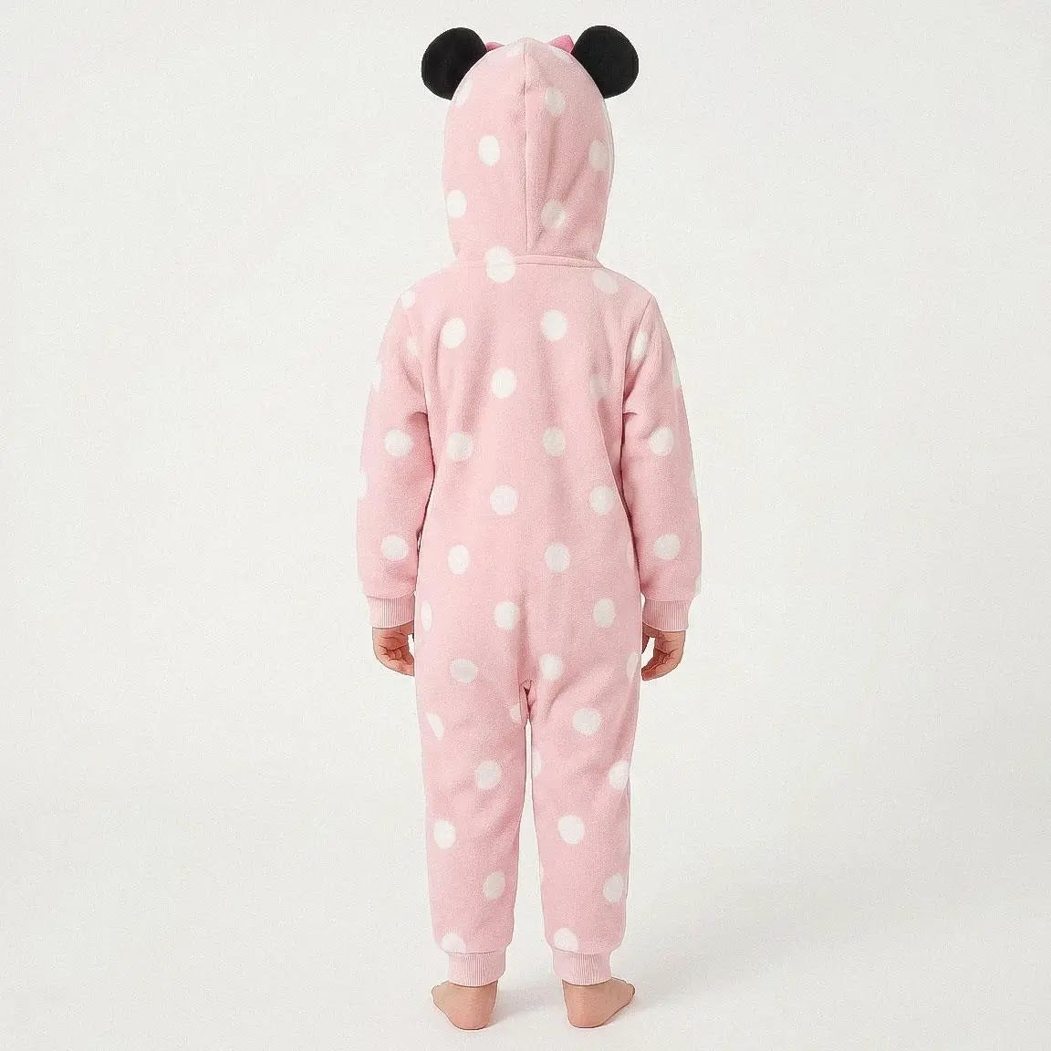Meisje in Minnie Mouse onesie achterkant