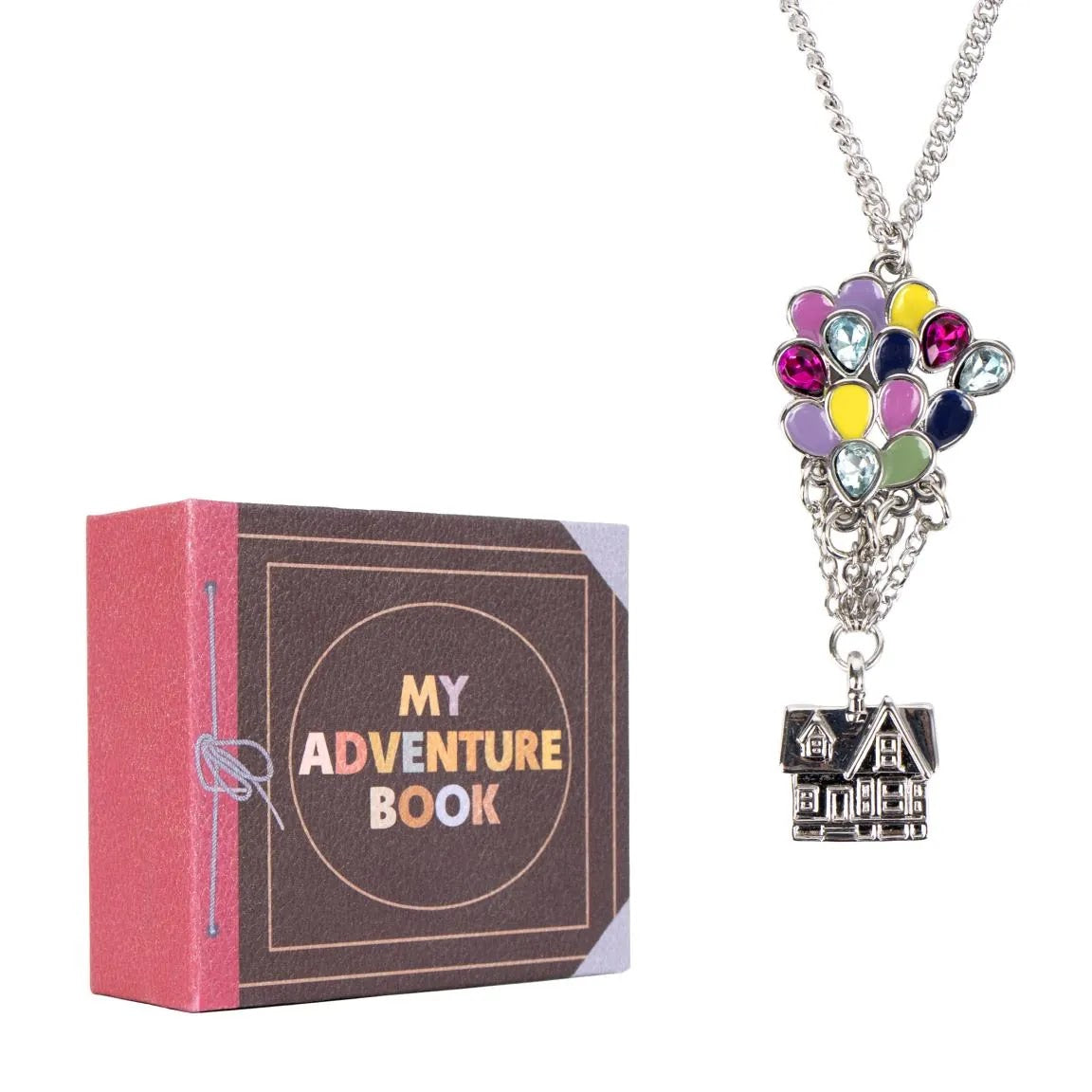 Disney Pixar Up ketting zilverkleurig met huis en ballonnen naast My Adventure Book cadeaudoos