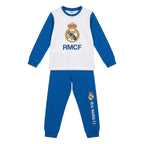 Real Madrid pyjama kinderen wit shirt met blauwe mouwen en clublogo, blauwe broek vooraanzicht