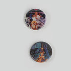 Twee buttons met klassieke Star Wars filmposters